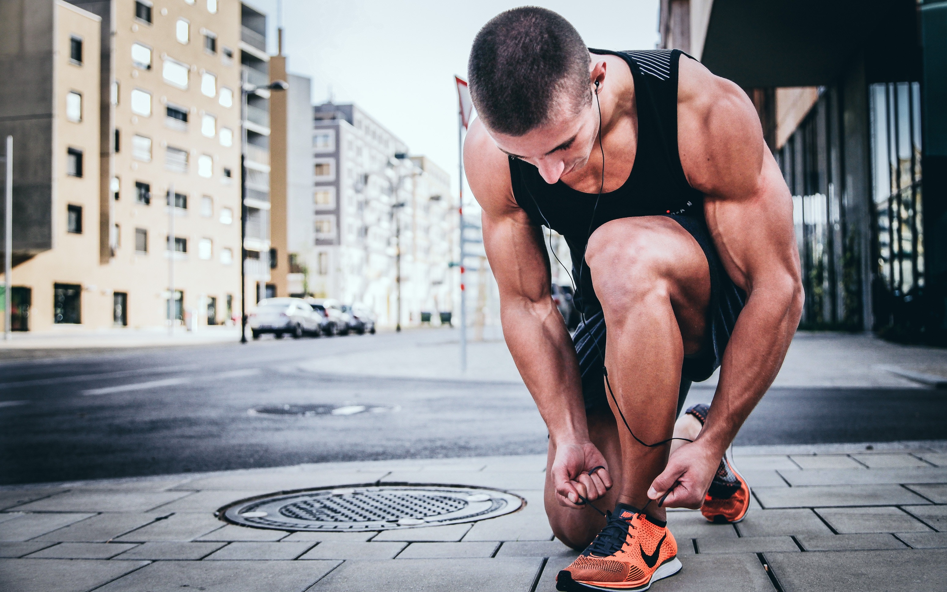 man tying his shoes best summer shoes for men