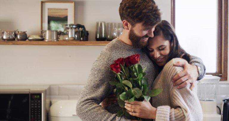 man giving woman flowers last-minute flower delivery