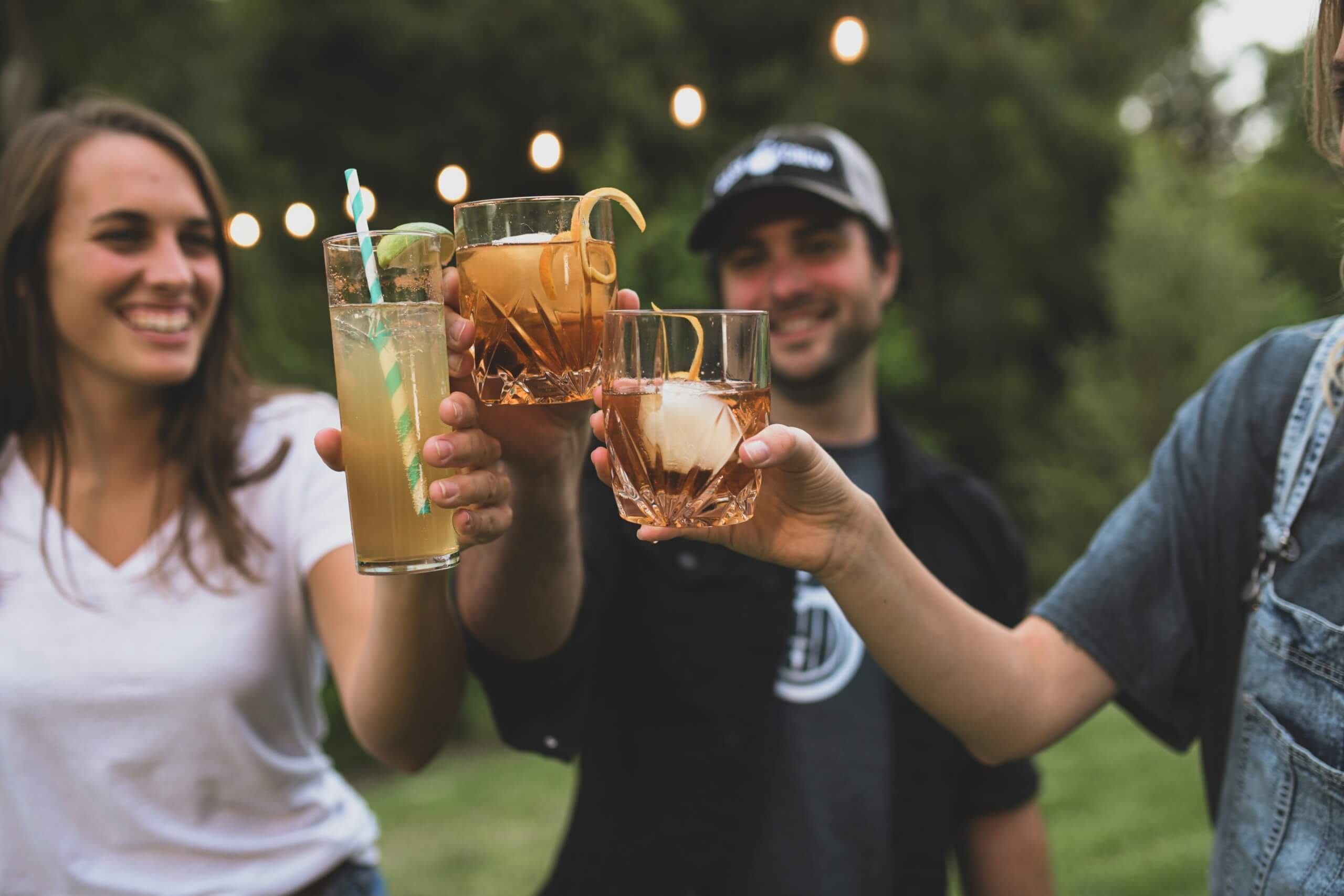 friends at a party backyard dinner party ideas