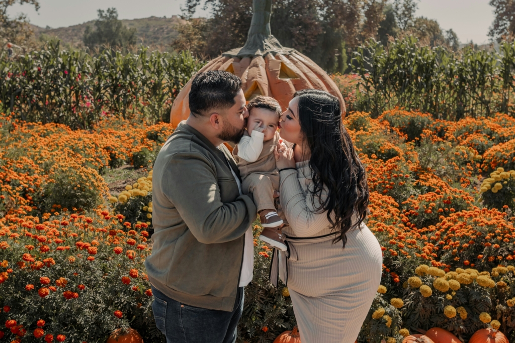 fall family photos at pumpkin patch fall bucket list for families