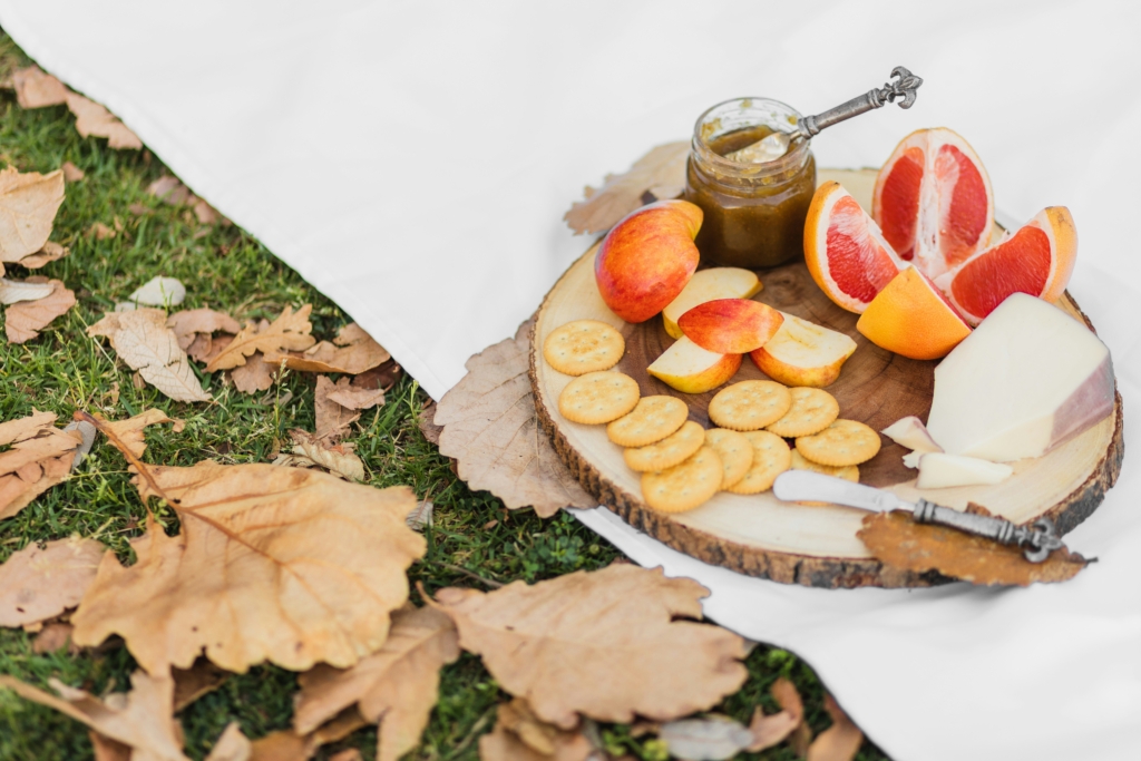 fall picnic charcuterie board outdoors in the autumn fall bucket list for families
