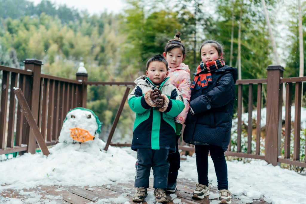 Outdoor Time in Winter kids playing in the snow