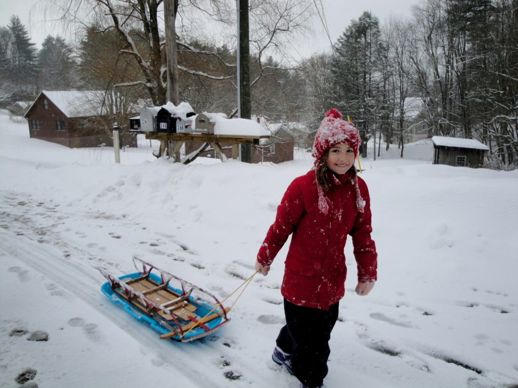 girl pulling sled Outdoor Time in Winter outside