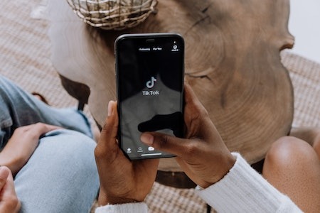 Person Holding Black Android Smartphone - social media management jobs