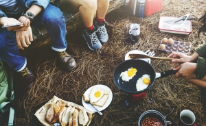 Group of friends camping together cooking food camping meals for families camping food