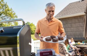 Best Meat delivery for 4th of July - man grilling