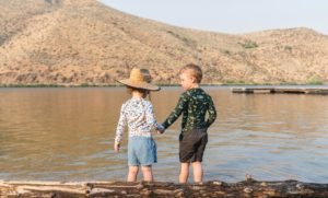 Preparing Kids for Their First Camping Trip - kids at the lake