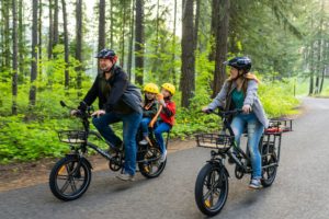 tips for safe family biking - mom dad and kids on bikes