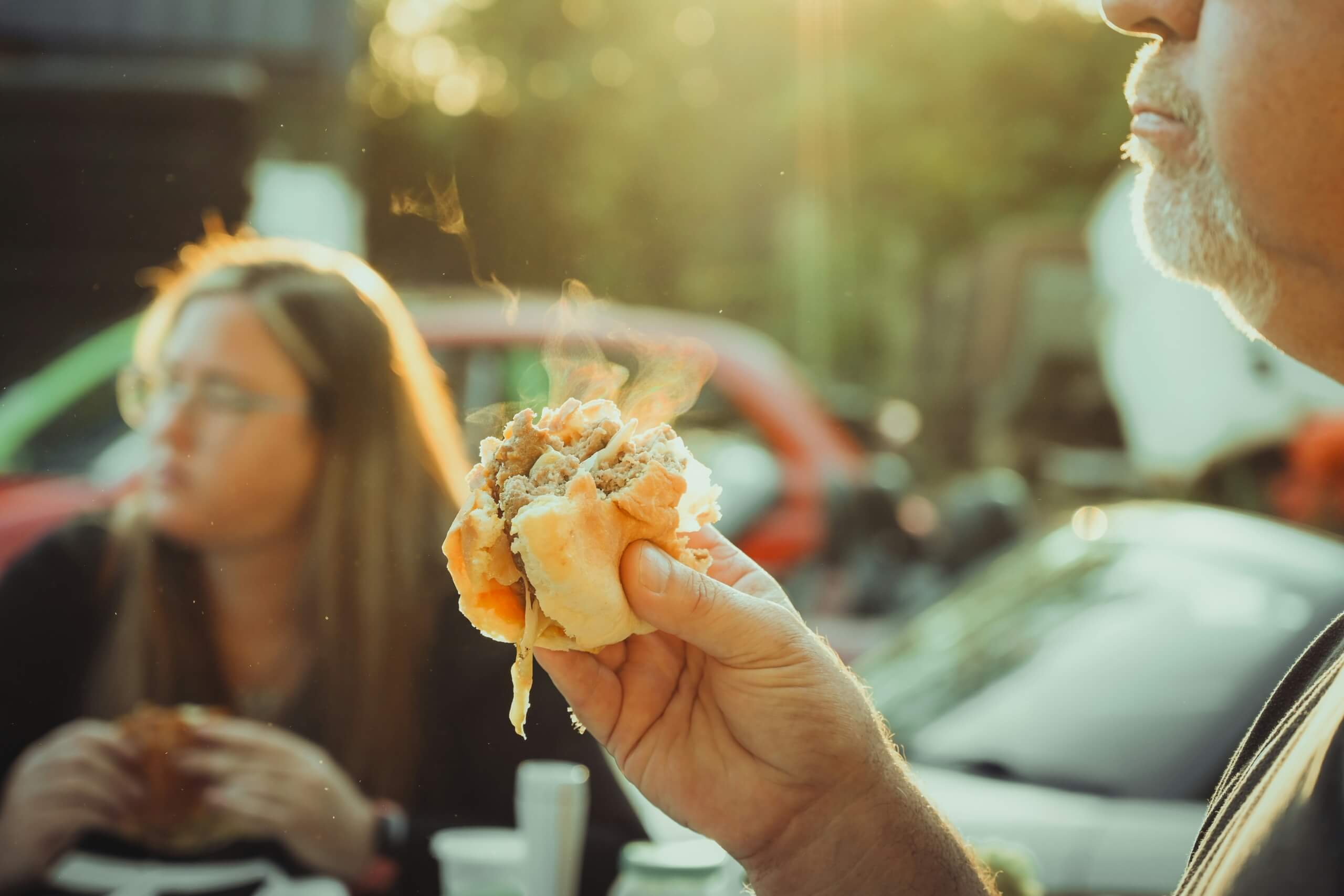 meat for labor day - man eating a burger