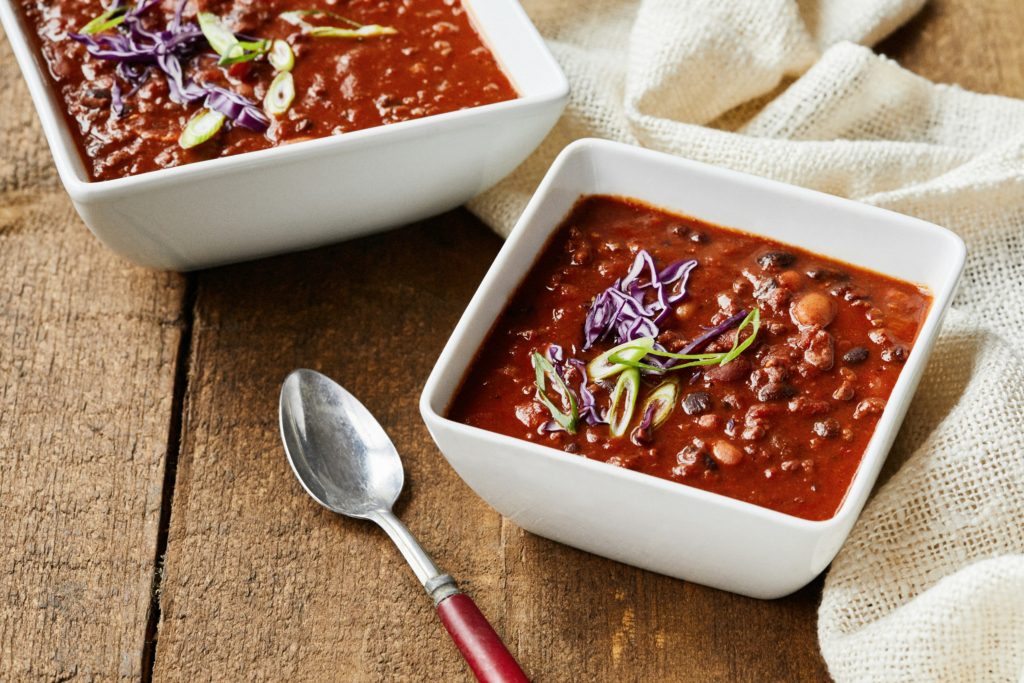 bowls of chili Outdoor Cooking Ideas for Cold Weather