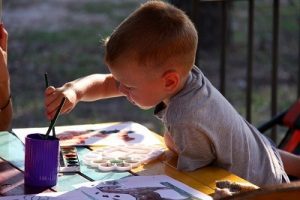 Rainy Day Activities - Kids and parents painting