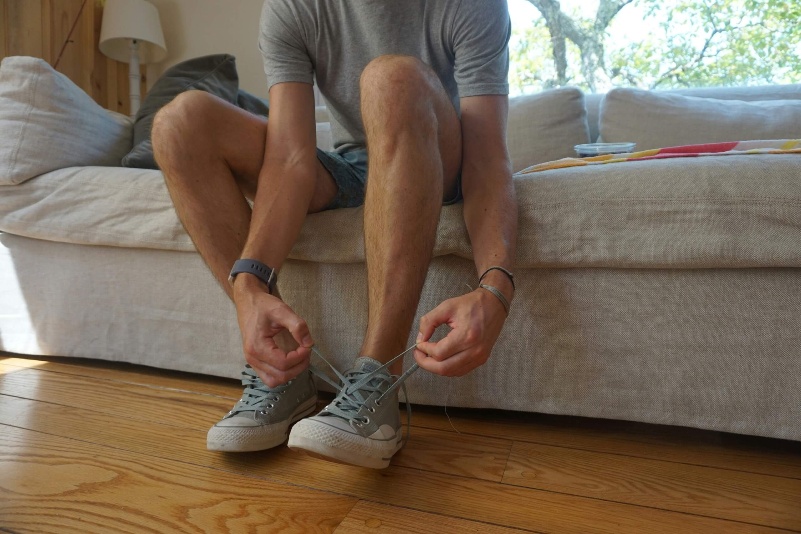 man tying his shoes best summer shoes for men