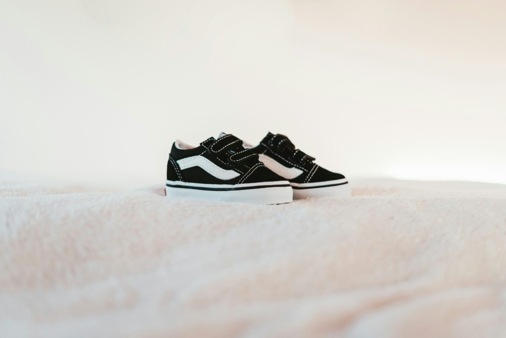 What to Look for When Shopping for Back to School Shoes for Boys Cushioned midsoles: These are vital for absorbing impact and providing comfort while your little one is out and about. Durable outsoles: Look for rubber or reinforced materials that can hold up against scuffs and scrapes.  Breathable uppers: To prevent stinky, sweaty feet, shoes with mesh panels or knit materials will help with air flow and circulation. Secure closures: It doesn’t matter if it's a lace-up system or an elastic strap, having a secure closure is important to keep shoes comfortably in place. Flexible materials: Shoes that move naturally with the foot will reduce strain and prevent injuries while he’s running and playing. Reinforced toe protection: Having that extra bit of durability will extend the life of the shoes while also protecting his toes!