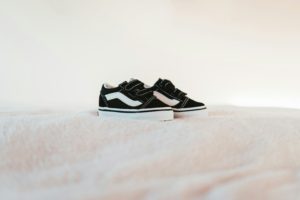 What to Look for When Shopping for Back to School Shoes for Boys Cushioned midsoles: These are vital for absorbing impact and providing comfort while your little one is out and about. Durable outsoles: Look for rubber or reinforced materials that can hold up against scuffs and scrapes.  Breathable uppers: To prevent stinky, sweaty feet, shoes with mesh panels or knit materials will help with air flow and circulation. Secure closures: It doesn’t matter if it's a lace-up system or an elastic strap, having a secure closure is important to keep shoes comfortably in place. Flexible materials: Shoes that move naturally with the foot will reduce strain and prevent injuries while he’s running and playing. Reinforced toe protection: Having that extra bit of durability will extend the life of the shoes while also protecting his toes!
