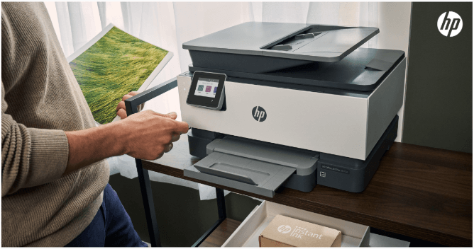 College supplies man printing photos