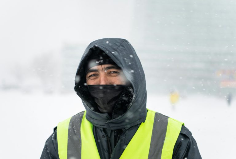 man working outside in the winter winter workwear