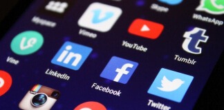 Close-up Photography of Smartphone Icons - social media management jobs