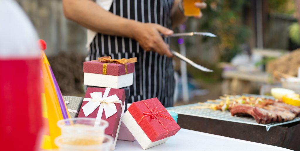 Happy New Year, New Year's holiday house party and exchange of gifts, barbecue party. gifts for the grill master