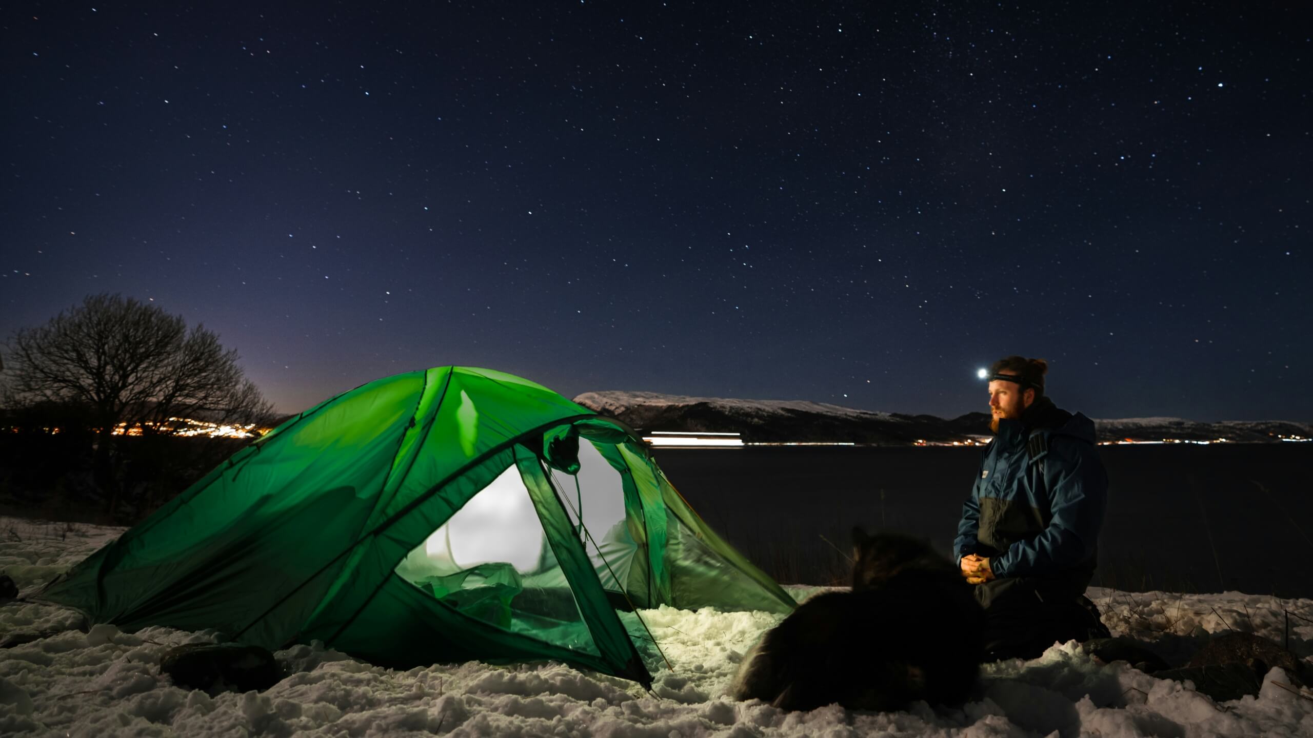 man camping with cold weather camping gear