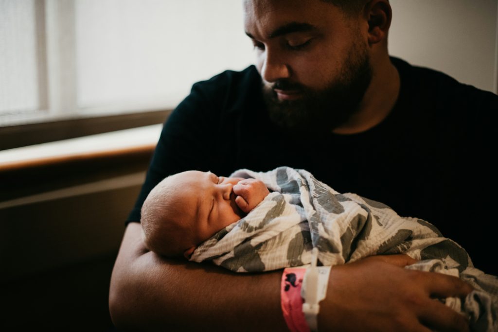 new dad with son New Dad Survival Guide