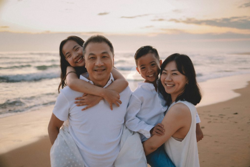 happy family smiling on vacation Best Family Spring Break Destinations